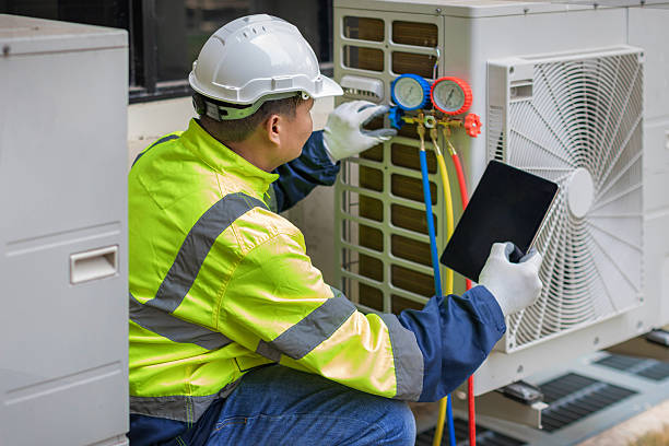 Professional Air Duct Cleaning technician working in Muscatine, IA